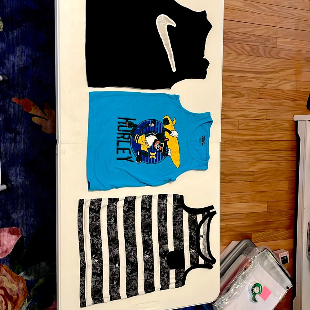 Three boys tank tops.